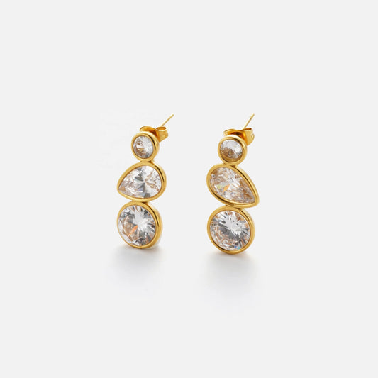 Elevate your style with the opulent gold and white diamond drop earrings, reminiscent of the delicate Iris flower. These exquisite earrings are waterproof, tarnish-free, and meticulously crafted with stainless steel and 18K gold plating.